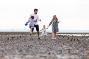 Lifestyle family photoshoot on the beach in leigh on sea