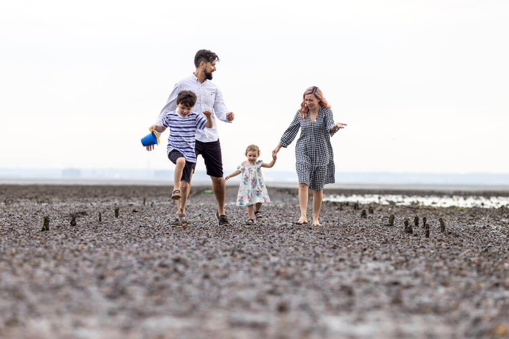 Lifestyle family photoshoot on the beach in leigh on sea